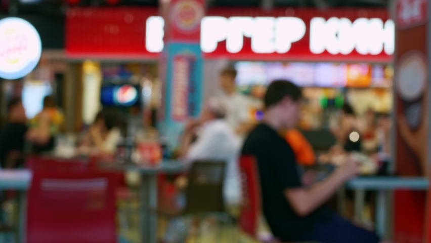The video was shot in blur. Shown catering. Summer tables with chairs are located in the visitor
