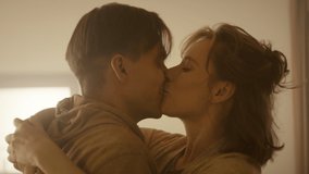 Young Couple In The Kitchen. Woman Shows Her Husband Positive Pregnancy Test. - Powered by Shutterstock - Get 15% off with code: PIKWIZARD15