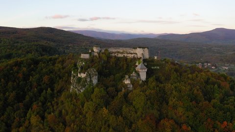 Aerial Shot Of Fort On Mountain Against Sky During Sunset, Drone Flying Upward - Una National Park, Bosnia and Herzegovina