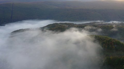 Aerial Panning Shot Of Beautiful Landscape Covered With Fog - Una National Park, Bosnia and Herzegovina