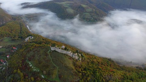 Aerial Shot Of Ruined Fort On Mountain During Foggy Weather - Una National Park, Bosnia and Herzegovina