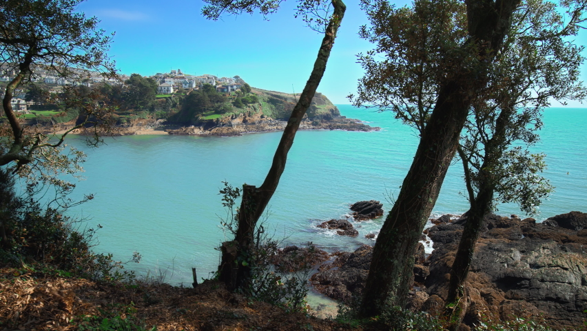 A view to Polruan, a small fishing village in Cornwall, England, United Kingdom. Coastline houses and beaches in 4K
