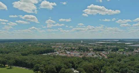Panoramic view of view at height roofs small town of house of residential quarters Monroe town near park NJ USA