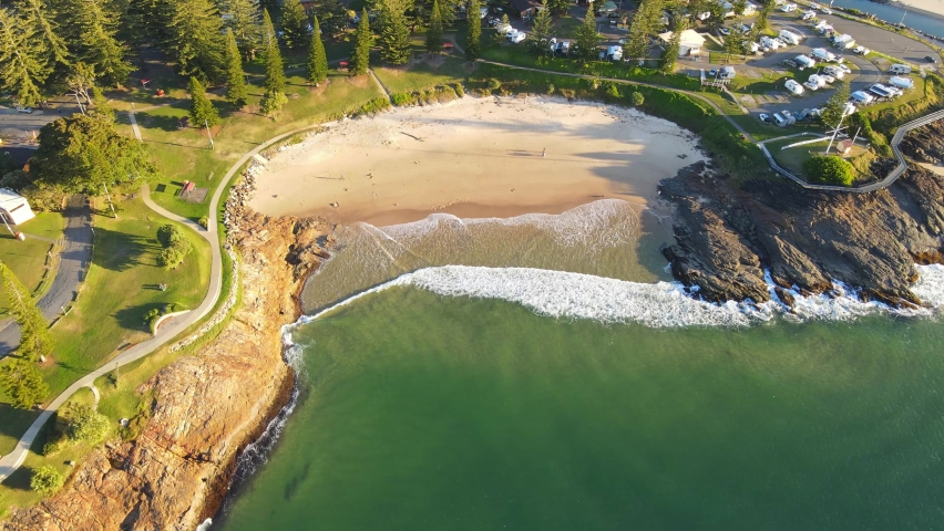 Aerial View Of Horseshoe Bay Beach At Point Briner With South West Rocks Creek In NSW, Australia. - pullback