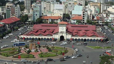 View of Ben Thanh Market in Ho Chi Minh City (formerly named Saigon), Vietnam. The main entrance with its belfry clock has become a symbol of Ho Chi Minh City. 