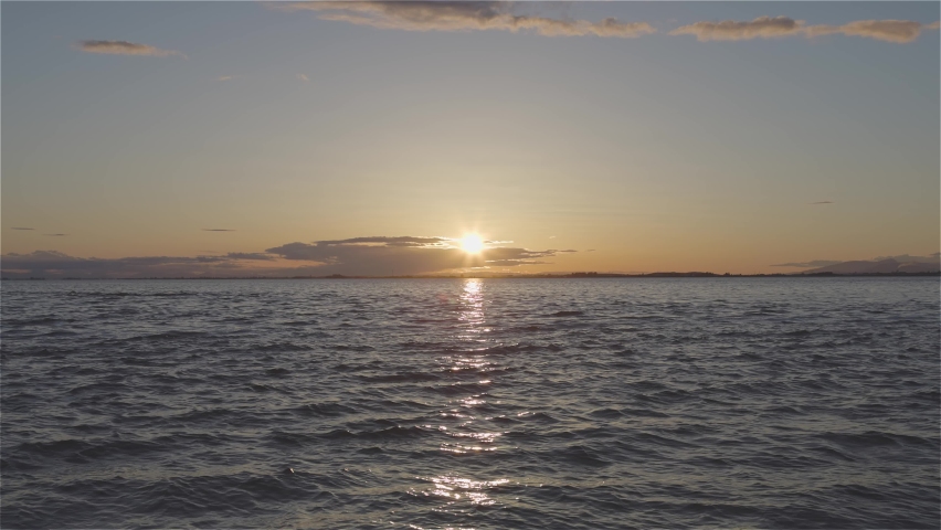 White Rock, Greater Vancouver, British Columbia, Canada. Colorful and Vibrant View of a cloudy and colorful sunset over the Pacific Ocean Coast. Nature Background