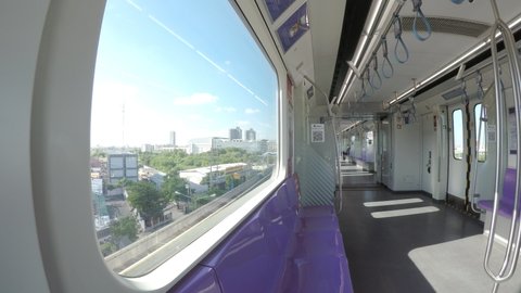 Bangkok, Thailand - 27 June 2021: MRT purple line between Tao-Poon to Khlong-Bang-Phai.Metropolitan Rapid Transit (MRT) purple line, Train park at the platform waiting for the passenger.
