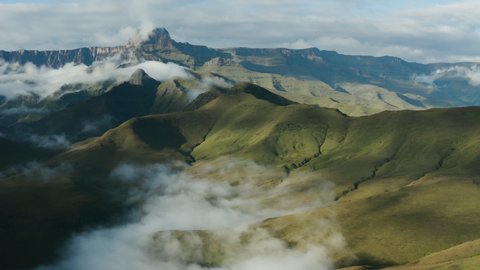 Aerial view of clouds drifting in the spectacular Drakensberg mountains, KwaZulu-Natal,South Africa