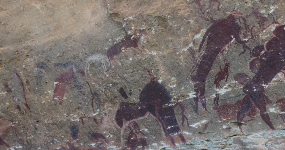 Panning view of well preserved San bushman paintings in the Main caves at Giants Castle,Drakensberg, KwaZulu-Natal,South Africa