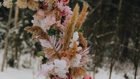 Beautiful wedding arch shot outdoors in winter. Close-up shooting