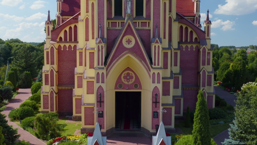 Aerial view over The Church of the Holy Trinity is a Catholic church in the agro-town Gervyaty, Grodno region, Belarus. Built in 1899-1903 in the neo-gothic style.
