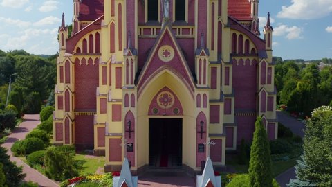 Aerial view over The Church of the Holy Trinity is a Catholic church in the agro-town Gervyaty, Grodno region, Belarus. Built in 1899-1903 in the neo-gothic style.