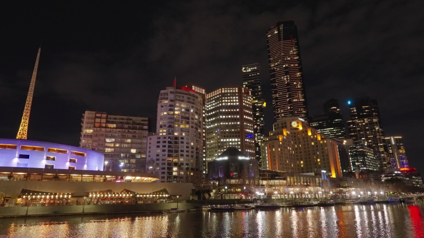 Moving shot of Southbank in Melbourne CBD at night