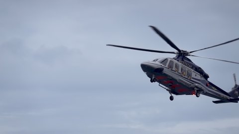 KELANTAN, MALAYSIA - OCT 22th 2021: Slow motion footage of Weststar AW139 helicopter on air with offshore passengers ready for landing. 