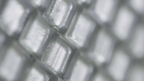 Detailed macro shot of mosaic made from pieces of glass. A pattern of transparent tiles with different depth of field close up. Handicraft in creative workshop, handicraft. Slow motion ready 59.94fps. - Powered by Shutterstock - Get 15% off with code: PIKWIZARD15