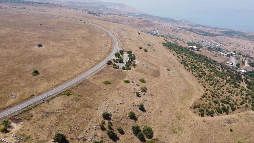 Aerial top down drone shot above a road in the Golan Heights, Israel. 