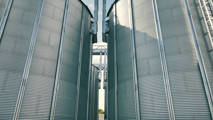 tanks for processing and storage of soybean and wheat grain. Harvesting and processing and storage elevator Royalty-Free Stock Footage #1075363013
