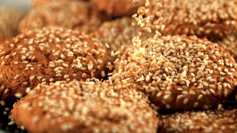 Super slow motion on fresh oatmeal cookies fall sesame. Macro background. Filmed on a high-speed camera at 1000 fps.