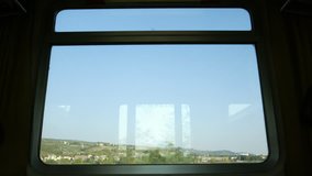 time lapse movie of the view from a train window as it races through the european conrtyside