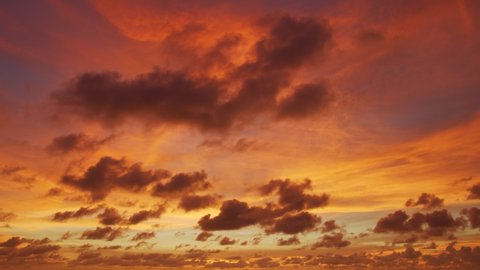 
cloud moving in red sky during stunning sunset.
scenery red sky with clouds moving panorama summer.
stunning red sunset over the sea. video 4K Nature video High quality footage.
