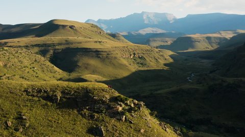 Aerial fly over view of tourists standing and admiring the Bushman's River at Giant's Castle, Drakensberg, KwaZulu-Natal,South Africa