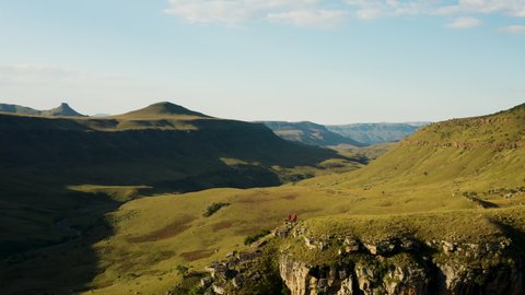 Aerial circular view of tourists standing and admiring Giant's Castle, Drakensberg, KwaZulu-Natal,South Africa
