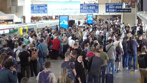 Pulkovo airport, passengers in the departure terminal hall. Russia, Saint Petersburg June 2021