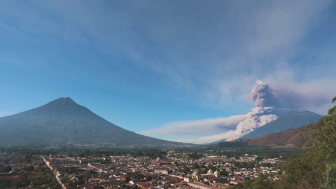Early morning eruption of Fuego volcano next to Acatenango volcano near Antigua, Guatemala, Central America. (time-Lapse)