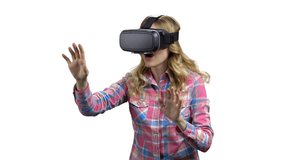 Young woman wearing virtual reality glasses.