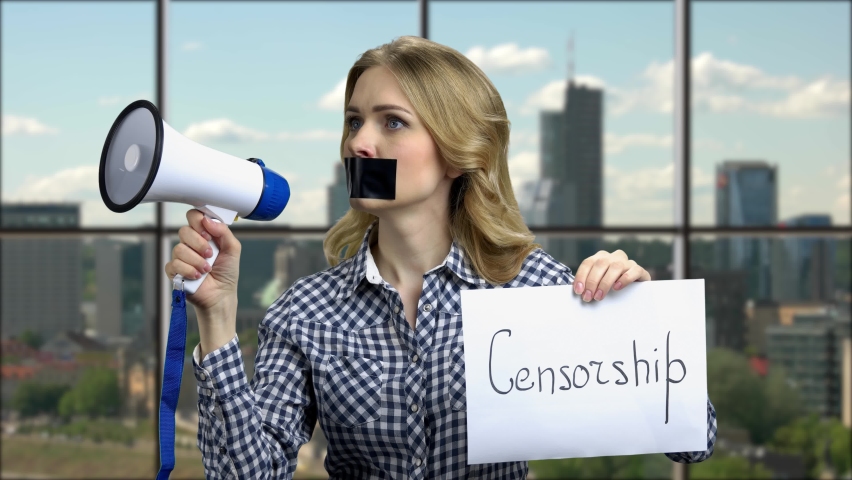 Sealed woman with megaphone can not speak.