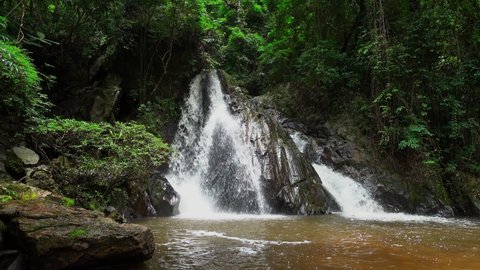 Leva or Rak Jung Na mon Waterfall at Ban Na mon in Wiang Haeng District, Chiang Mai, Thailand. Waterfall in located in deep rain forest jungle