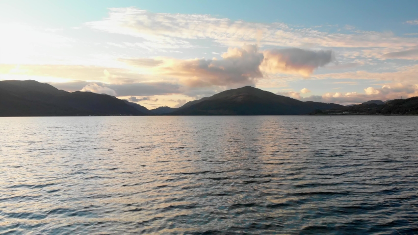 Aerial Footage of Loch Long and the surrounding mountains in West Scotland. Loch Long extends from the Firth of Clyde in Argyll and Bute, Scotland