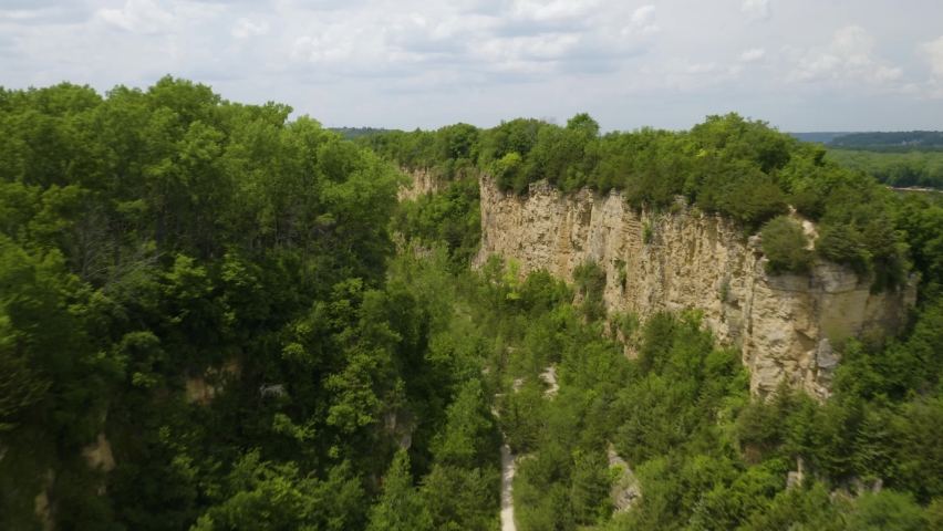 Aerial Hyperlapse Reveals Mississippi River Hidden behind Limestone Cliffs in Horseshoe Bluff Hiking Area. Iowa