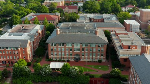University of North Carolina at Chapel Hill. UNC campus aerial flight over classroom academic buildings and dorms, student housing.