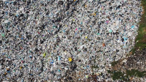 Aerial view of huge rubbish dump. Trash and garbage landfill. Ecology problem, nature pollution. Consumerism economy cons.