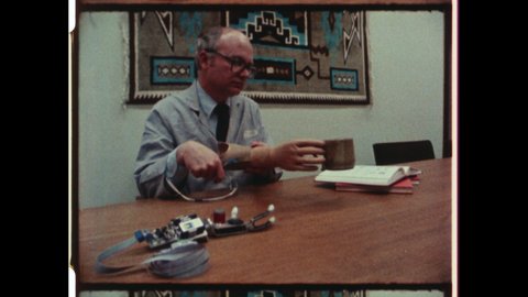 1980s Pittsburgh PA. Scientist Develop Robotic Prosthetic Limb. The Mind-controlled Robotic Arm is a Neuralink like early Noninvasive brain-computer interface (BCI). 4K Overscan of Archival Film Print