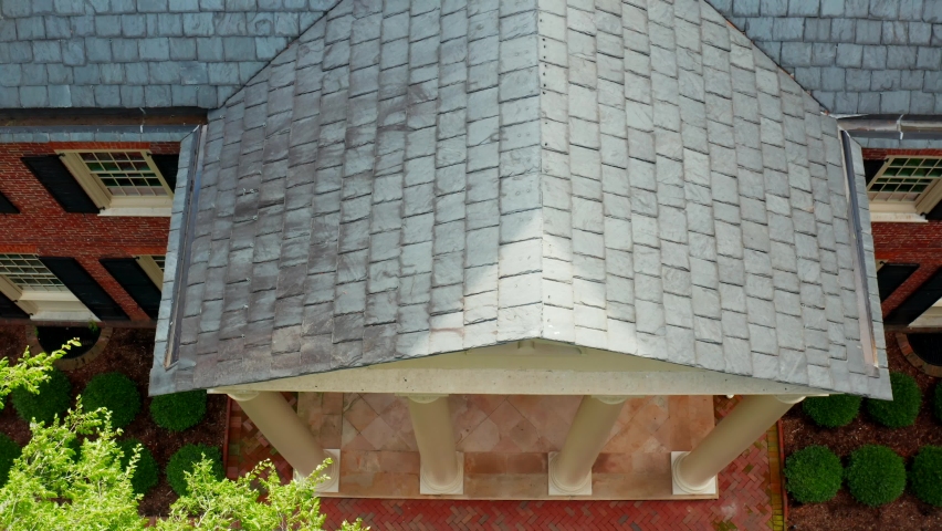 Traditional colonial Federal style architecture. Brick mansion with columns in Antebellum Southern USA. Carolina homestead, plantation.
