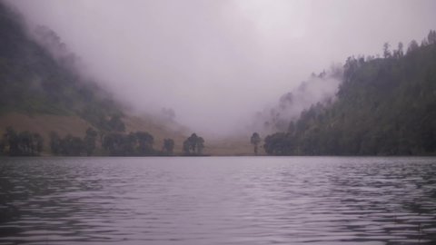 timelapse morning on the ranukumbolo , beautiful lake on the semeru mountain