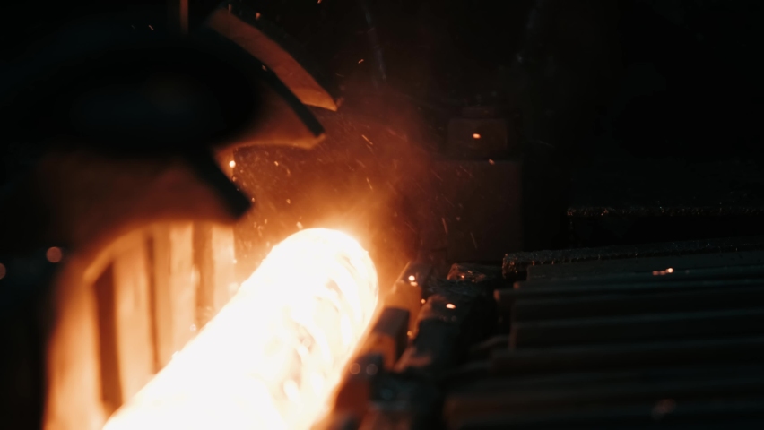 Steel Seamless Pipe Production Line. Hot Metal Tubes. Heavy Industry. Metal tube production line at metal factory. Hot steel pipe production line. Steel seamless pipe production process. Red hot metal Royalty-Free Stock Footage #1075483289