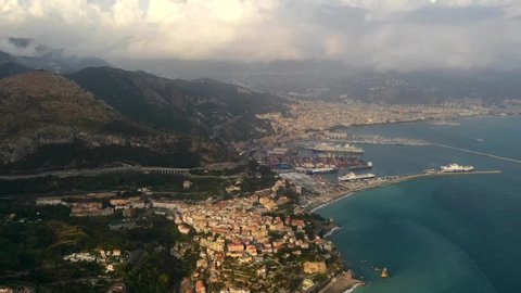 Aerial view to Vietri sul Mare and Salerno south city in Italy. Beautiful view from above to the sea and landscape. ships near town. Concept of tourism, journey and traveling. Boats and ships. 