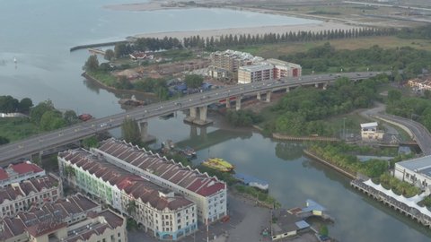Malaka City, Malaysia - December 21, 2020: Aerial drone cinematic establishing shot of Melaka city center, famous tourist location at Malaysia. 