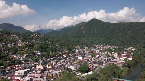 Aerial View, Tamazunchale, Valley Town in Central Mexico. Cityscape in Highlands of San Luis Potosi State, Drone Shot
