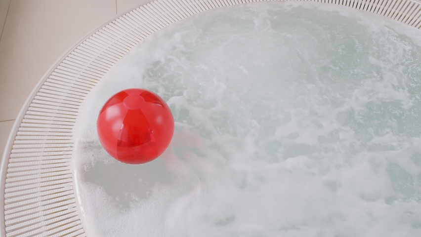 Red ball in the hot tube Royalty-Free Stock Footage #1075489784