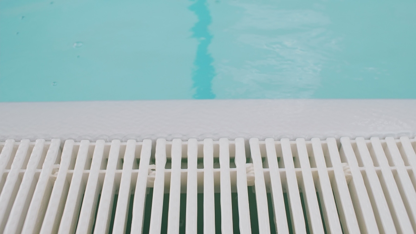 The edge of the swimming pool Royalty-Free Stock Footage #1075489787