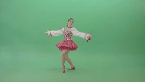 Ukraine Girl Dancing Folk Ethno Stage dance. Attractive girl in short red skirt and white blouse with national Ukrainian ornament dancing traditional folk dance in green screen studio.