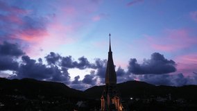 
scenery sunset above Chalong pagoda in Phuket province.
Chalong temple is the one popular landmark in phuket
4k video colorful cloud scape sky sunset.travel culture concept.