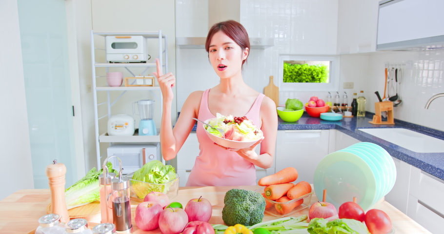 Asian pretty live streamer introduce how to eat healthy online with fruits and vegetables