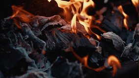 dying fire or dying consequences after a fire, shot in close-up slow-motion video