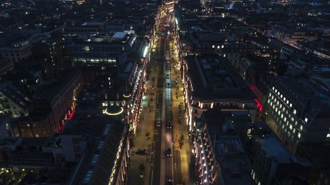 Establishing Aerial View Shot of London UK, United Kingdom, Regent Street at night evening
