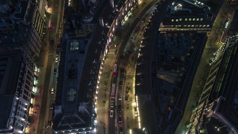 Establishing Aerial View Shot of London UK, United Kingdom, Arch Turn Regent Street at night evening